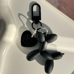 Matte black pup charm keyring with heart